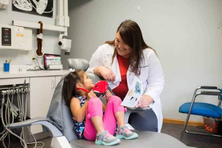 Dr. Lucia Gerstmann with a young patient