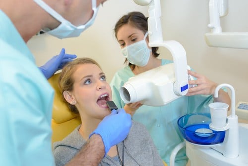 teen getting dental x-ray