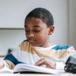 boy doing schoolwork