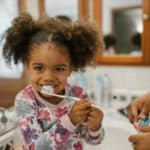 kid brushing teeth